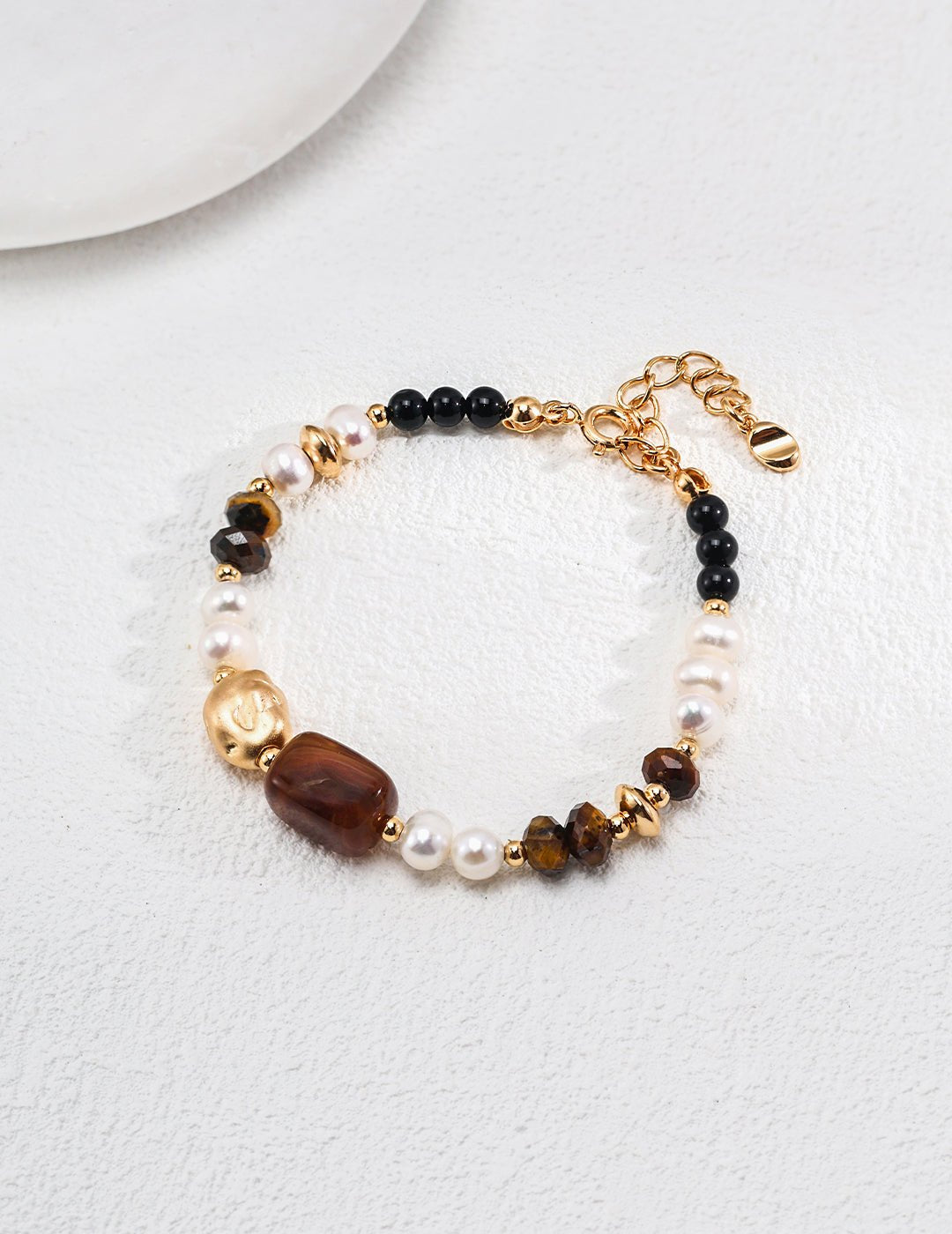 Bracelet with pearl, tiger eye, and agate beads in a gold-plated silver by ronny