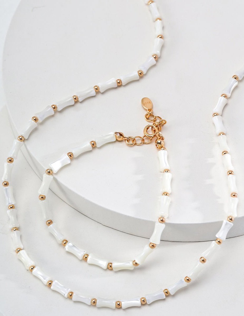 Bamboo Necklace and Bracelet  featuring conch shell with gold-plated silver by ronny