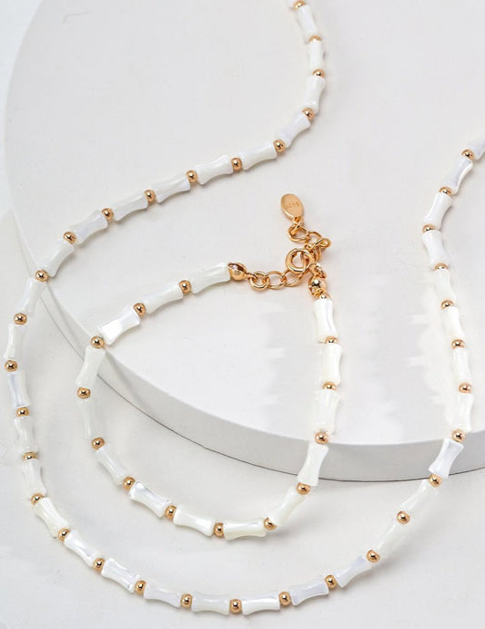 Bamboo Necklace and Bracelet  featuring conch shell with gold-plated silver by ronny