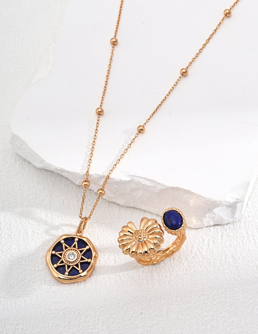 Gold-plated necklace with compass pendant and Lapis Lazuli ring by ronny