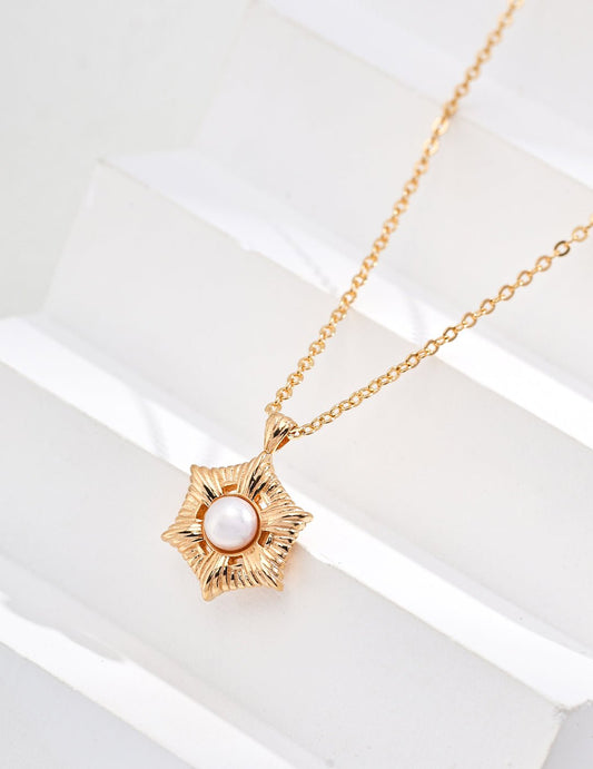 Natural Pearl Pendant with Gold - Plated Silver Chain by ronny