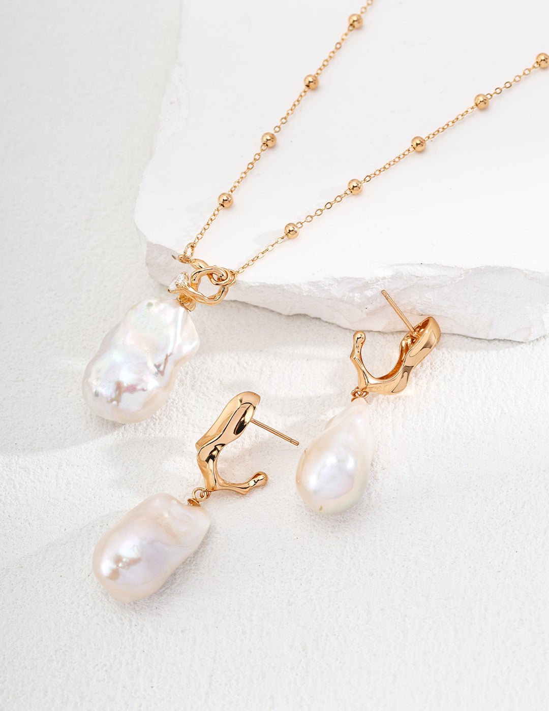 Baroque Pearl Necklace and matching Earrings with Gold - Plated Silver by ronny