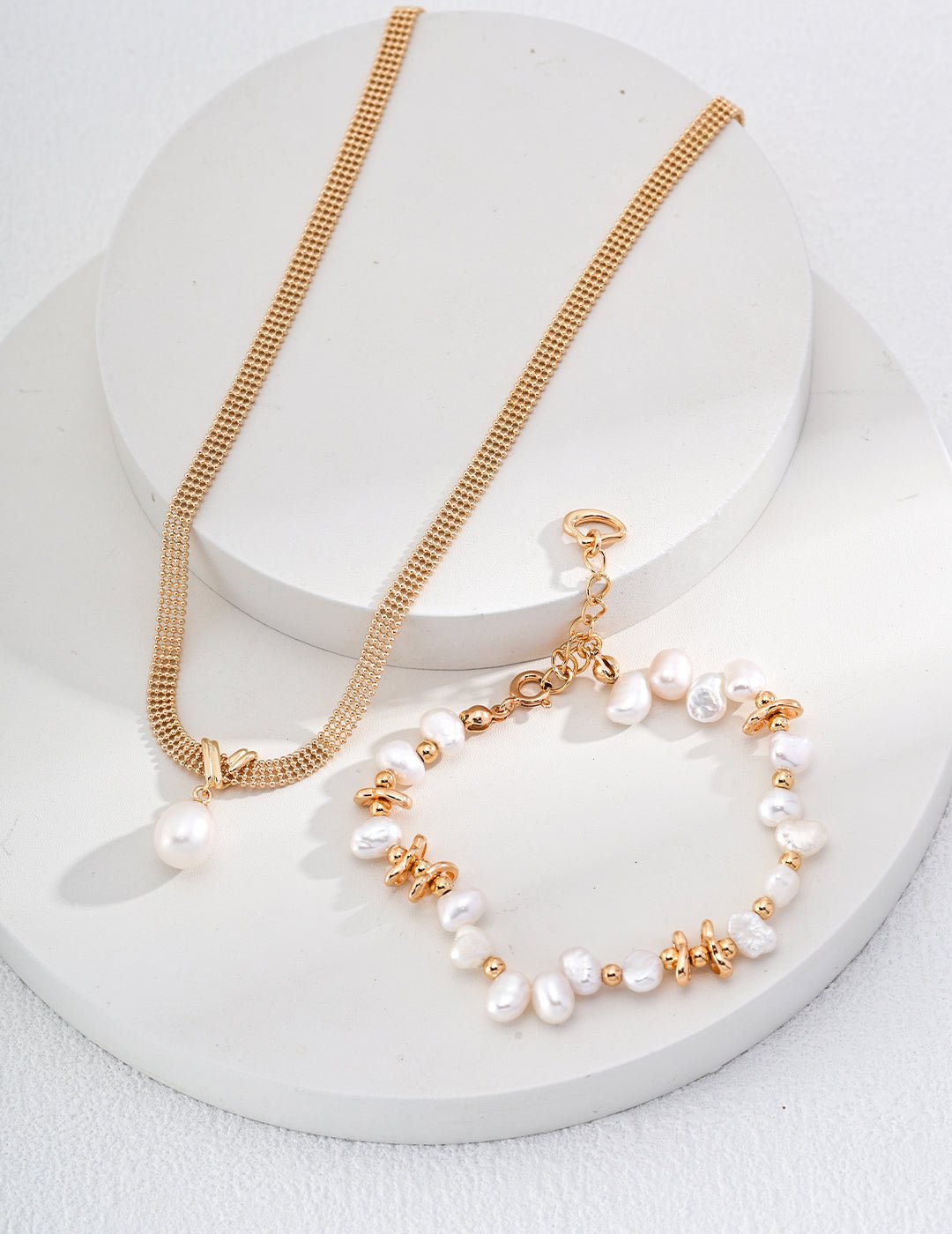 Natural Pearls Bracelet and matching Necklace with Gold - Plated Silver by ronny