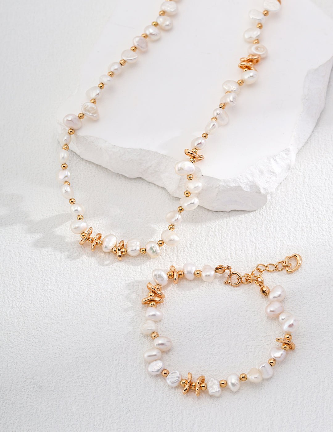 Natural Pearls Bracelet and matching Necklace with Gold - Plated Silver by ronny