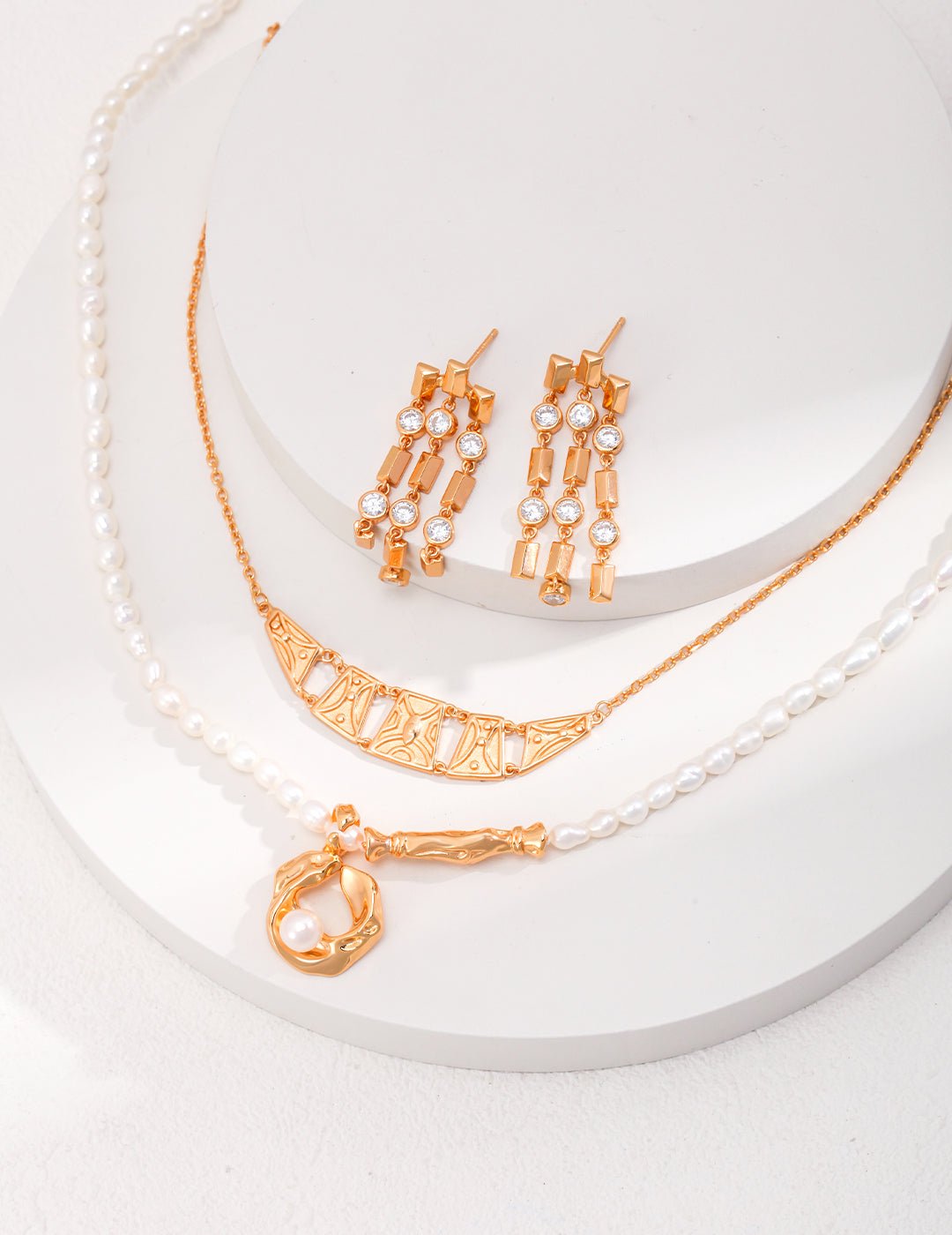 Gold - Plated Silver Necklace and Pearl Necklace with matching Earrings by ronny